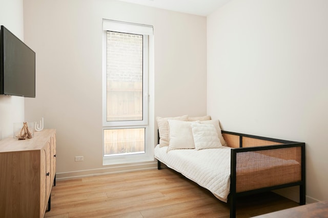 sitting room with light hardwood / wood-style floors