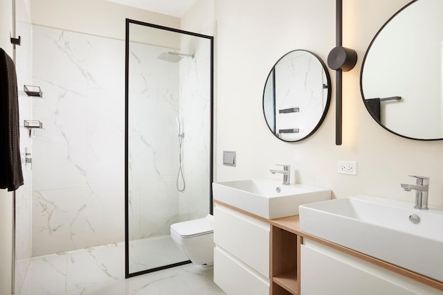 bathroom featuring toilet, vanity, and tiled shower