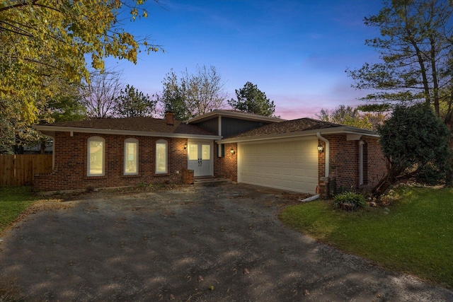 ranch-style house with a garage