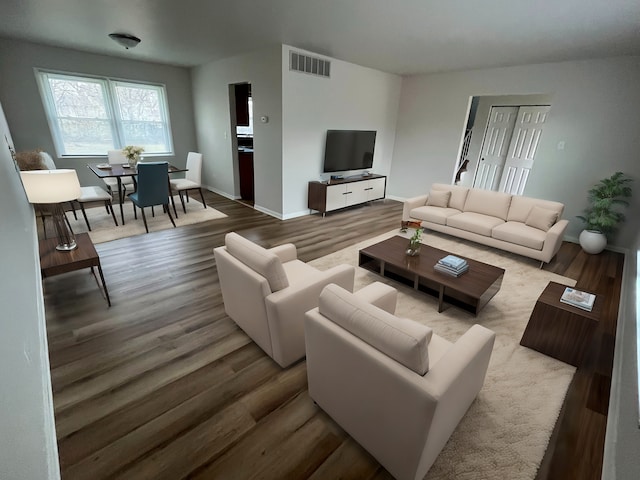 living room with hardwood / wood-style flooring