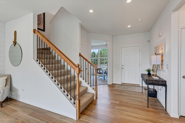 foyer with light hardwood / wood-style flooring