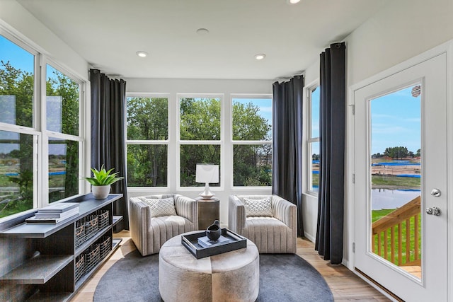 sunroom / solarium featuring plenty of natural light