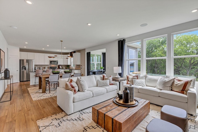 living room with light hardwood / wood-style floors