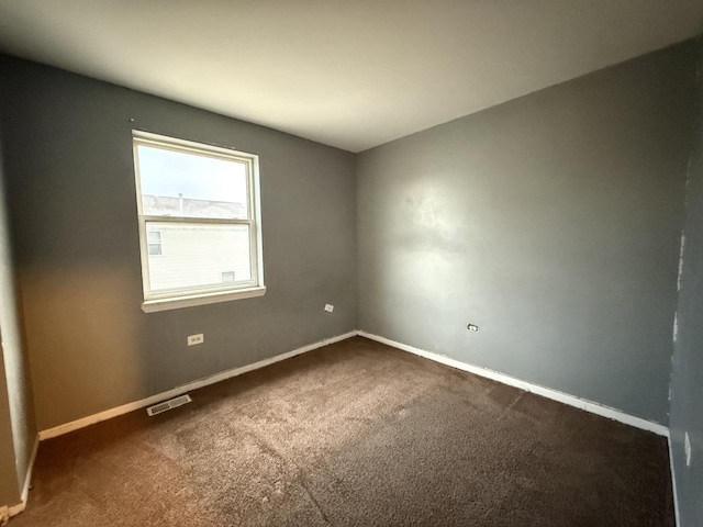 spare room with carpet floors