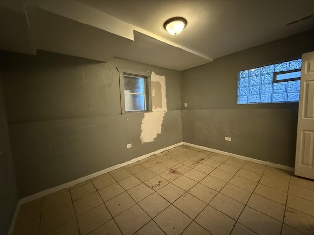 view of tiled spare room