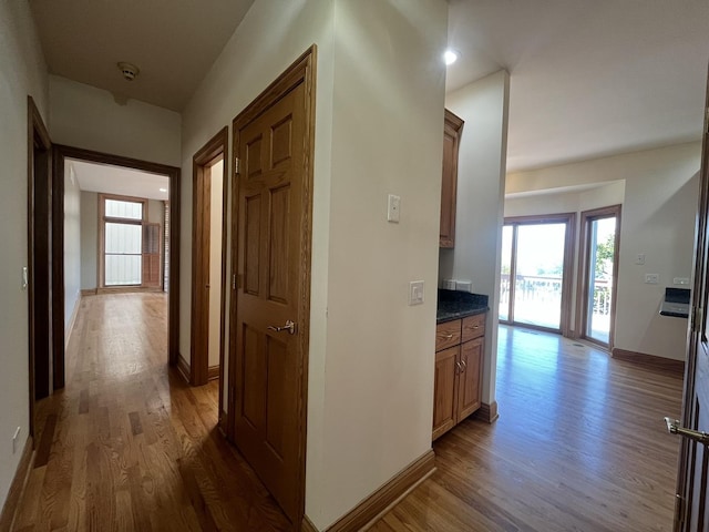 hallway featuring dark wood-type flooring