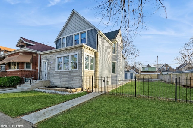 bungalow-style home with a front lawn