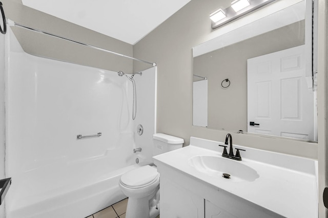 full bathroom featuring tile patterned floors, shower / tub combination, vanity, and toilet