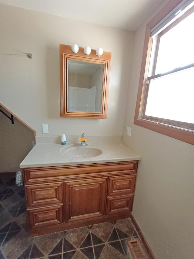 bathroom featuring vanity