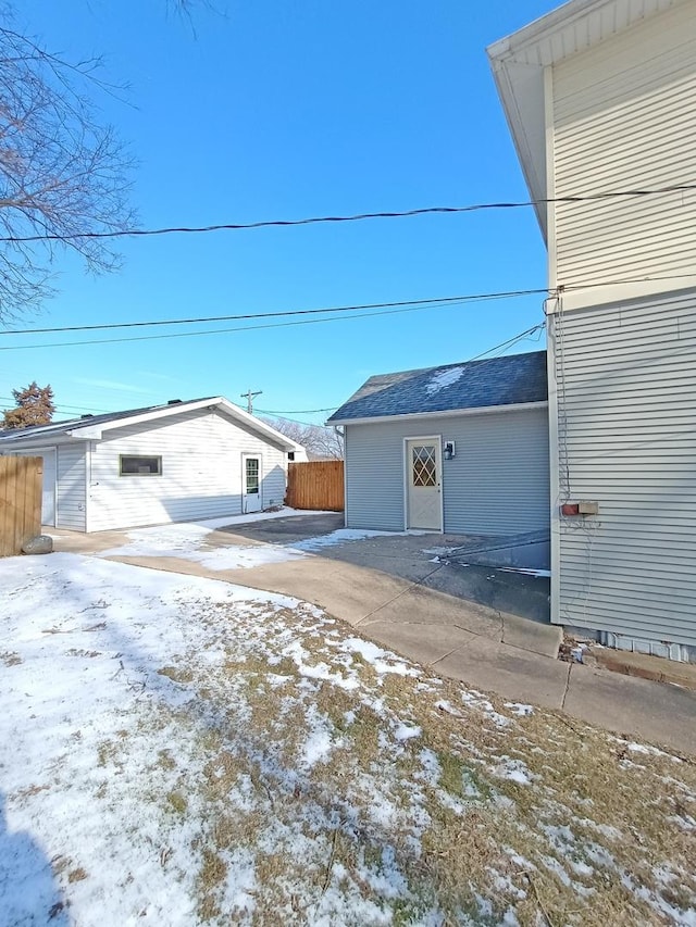 view of snow covered garage