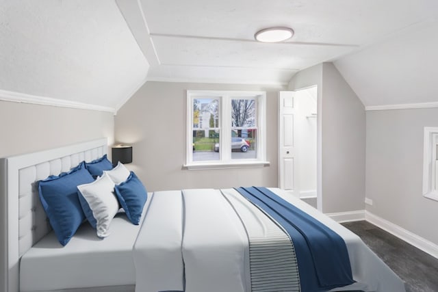 bedroom featuring vaulted ceiling