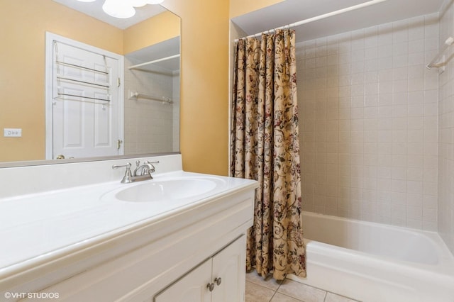 bathroom with tile patterned floors, vanity, and shower / bathtub combination with curtain