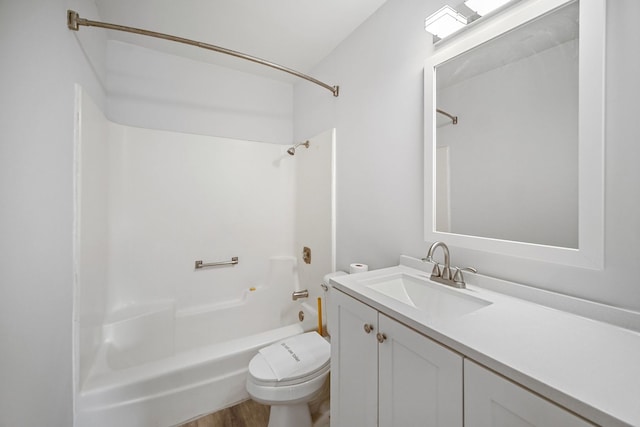 full bathroom featuring hardwood / wood-style flooring, vanity, shower / bathtub combination, and toilet