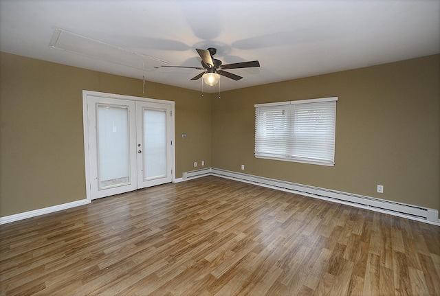 interior space featuring french doors, light hardwood / wood-style floors, baseboard heating, and ceiling fan