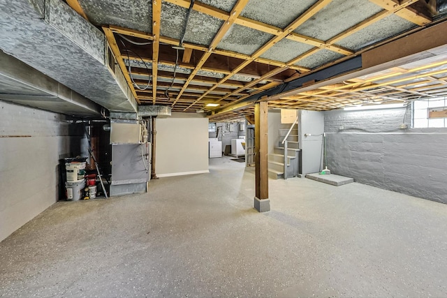 basement featuring separate washer and dryer