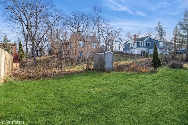 view of yard featuring a storage shed