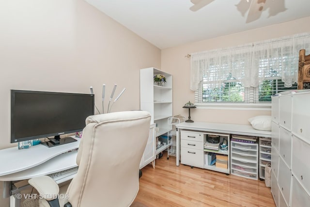 home office with light wood-type flooring