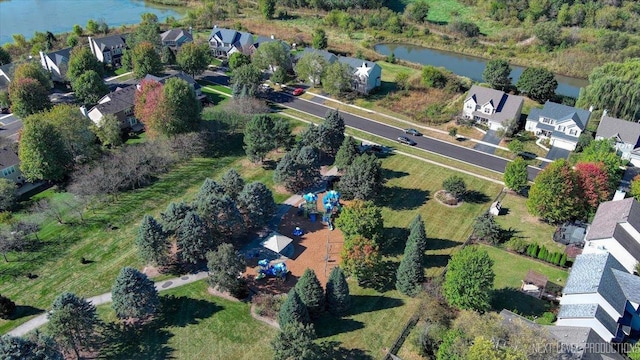 aerial view featuring a residential view and a water view