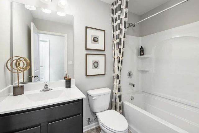 full bathroom with vanity, shower / bath combination with curtain, and toilet