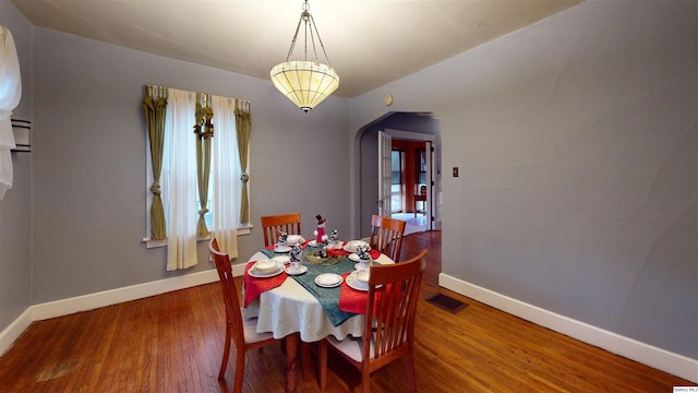 dining area featuring hardwood / wood-style floors