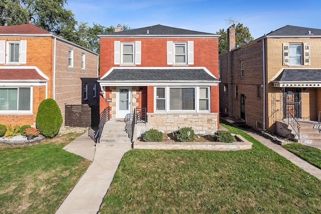 front facade with a front yard