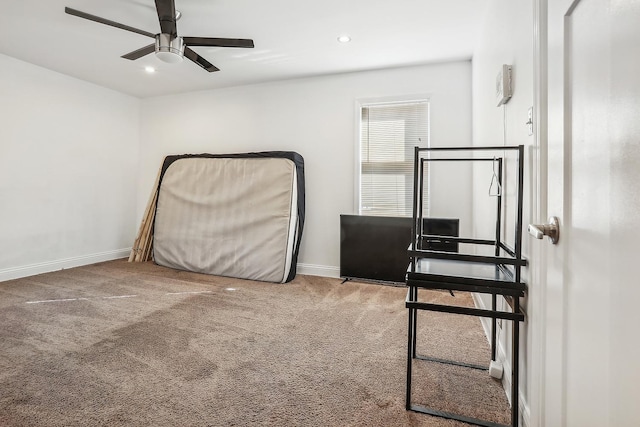 bedroom with ceiling fan and carpet floors