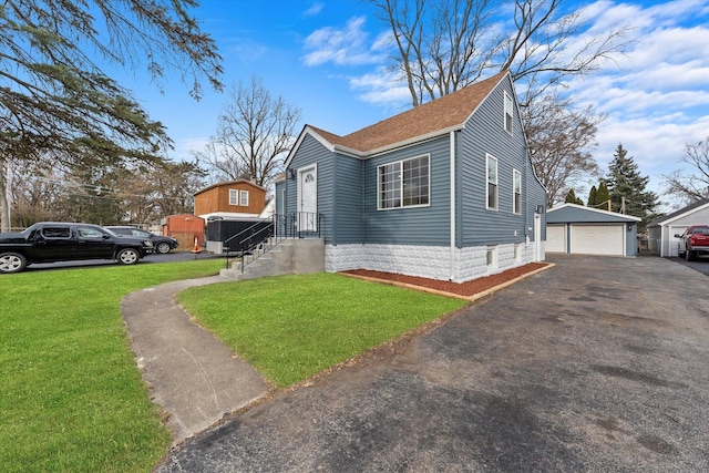 view of property exterior with a lawn, a garage, and an outdoor structure