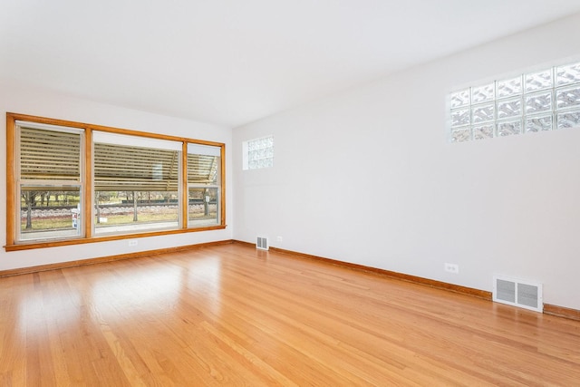 empty room with light wood-type flooring