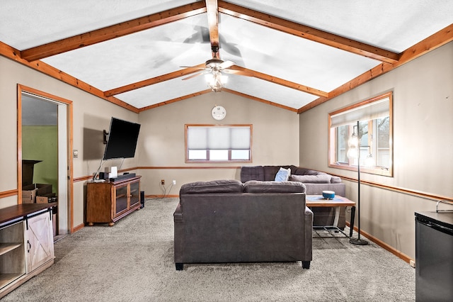 carpeted living room with vaulted ceiling and ceiling fan