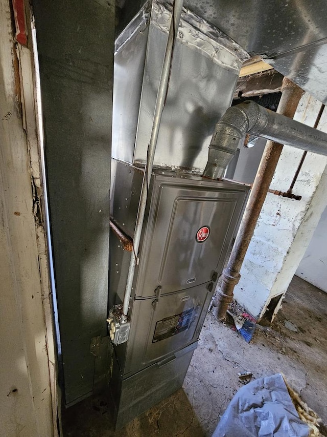 utility room with heating unit