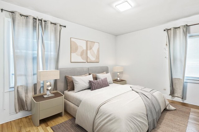 bedroom with wood-type flooring