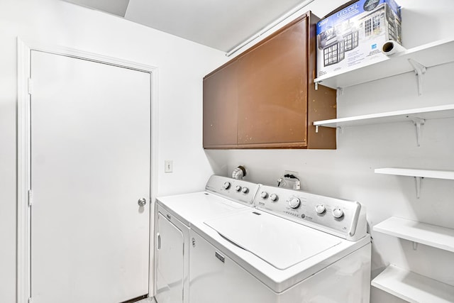 laundry area with separate washer and dryer