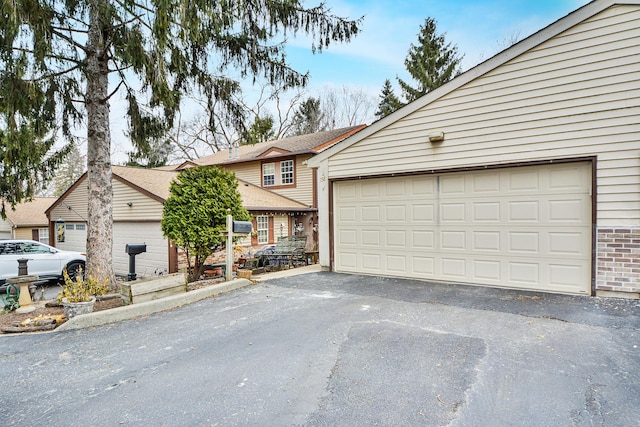 view of front of property featuring a garage