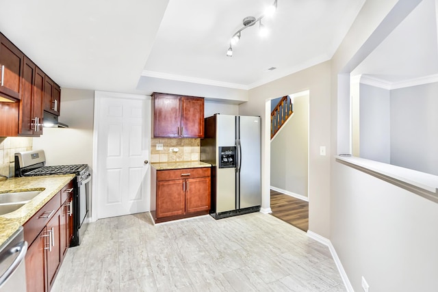 kitchen with tasteful backsplash, light hardwood / wood-style flooring, stainless steel appliances, and ornamental molding