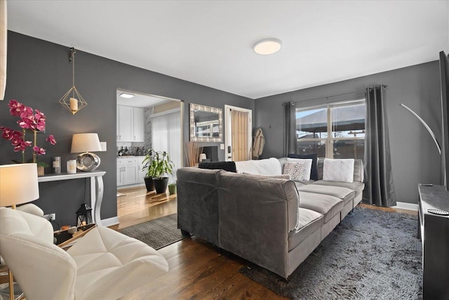 living room featuring dark hardwood / wood-style floors