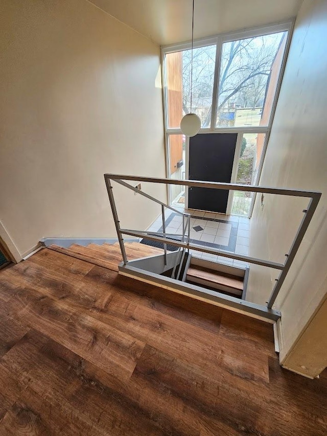 stairway with wood-type flooring