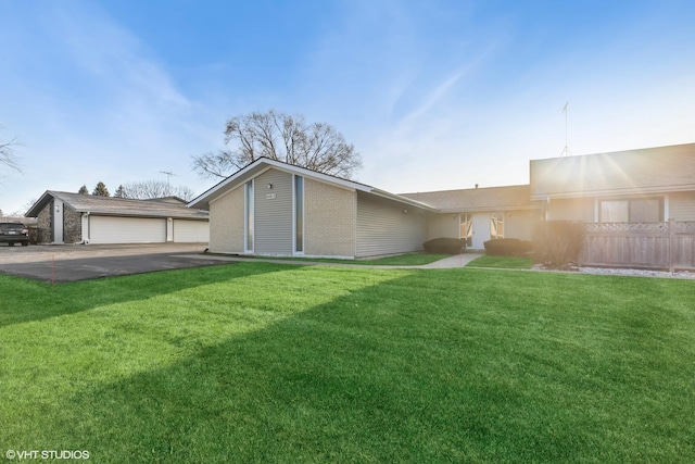 view of front of home with a front lawn