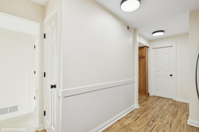 corridor featuring light wood-type flooring