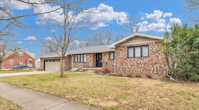 single story home featuring a garage and a front lawn