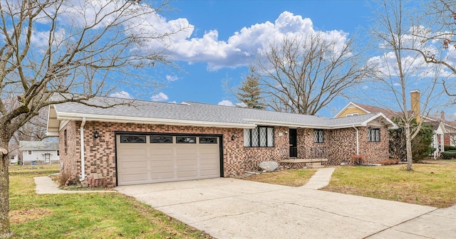 ranch-style house with a garage and a front lawn