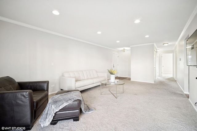 carpeted living room with crown molding