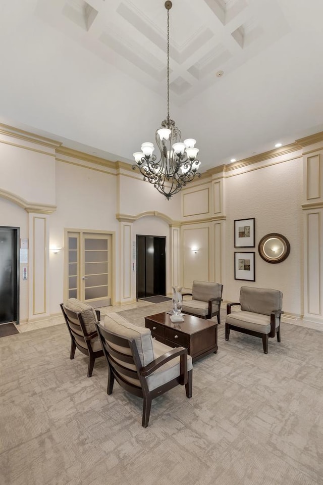 carpeted living room featuring a high ceiling, coffered ceiling, crown molding, beamed ceiling, and a chandelier