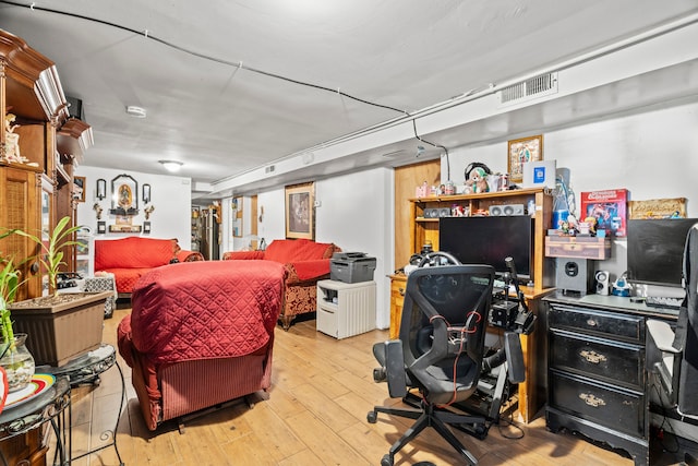 bedroom featuring light hardwood / wood-style floors