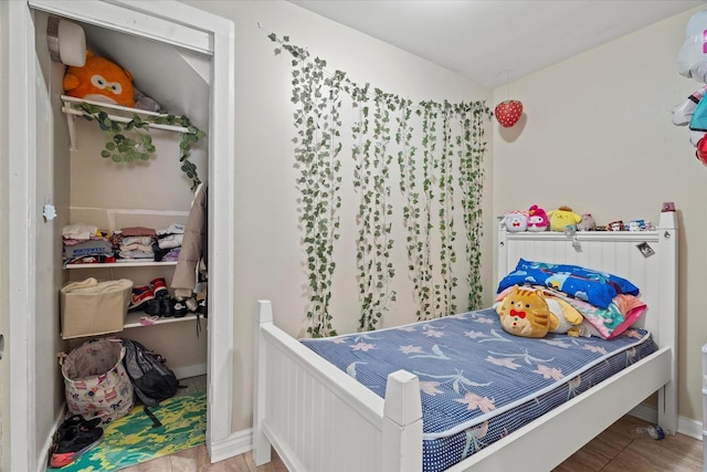 bedroom with light wood-type flooring