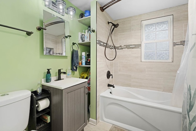 full bathroom featuring tile patterned floors, vanity, shower / bath combination with curtain, and toilet