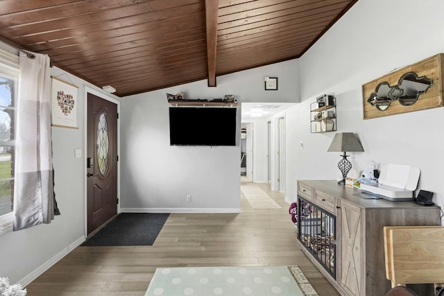 entryway with hardwood / wood-style floors, lofted ceiling, and wood ceiling