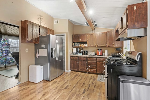 kitchen featuring appliances with stainless steel finishes, wood ceiling, extractor fan, lofted ceiling with beams, and light hardwood / wood-style floors