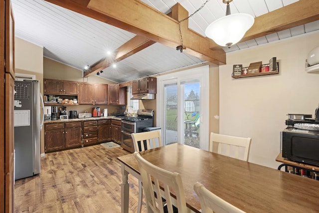 dining area featuring vaulted ceiling with beams, wood ceiling, and light wood-type flooring