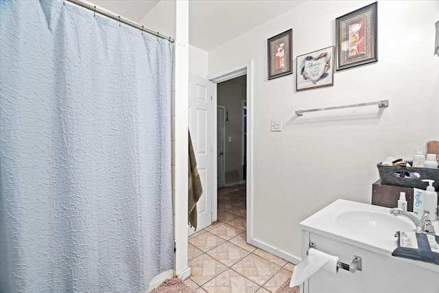 bathroom with vanity and tile patterned floors