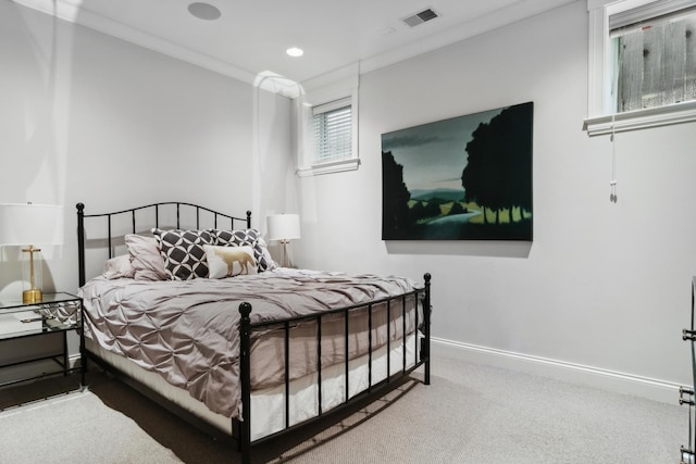 bedroom with carpet flooring and ornamental molding